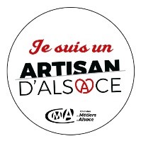 Logo circulaire avec le texte "Je suis un ARTISAN D'ALSACE"